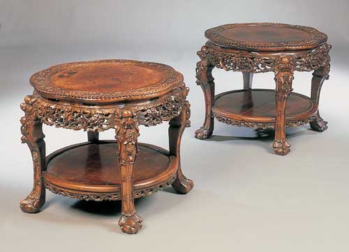 A pair of Chinese hardwood jardiniere stands