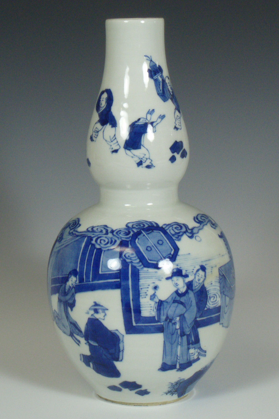 A 19th century Chinese double gourd blue painted vase In the Kangxi style