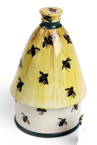 A Wemyss honey pot and cover,
