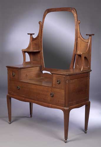 A Liberty and Co walnut dressing table