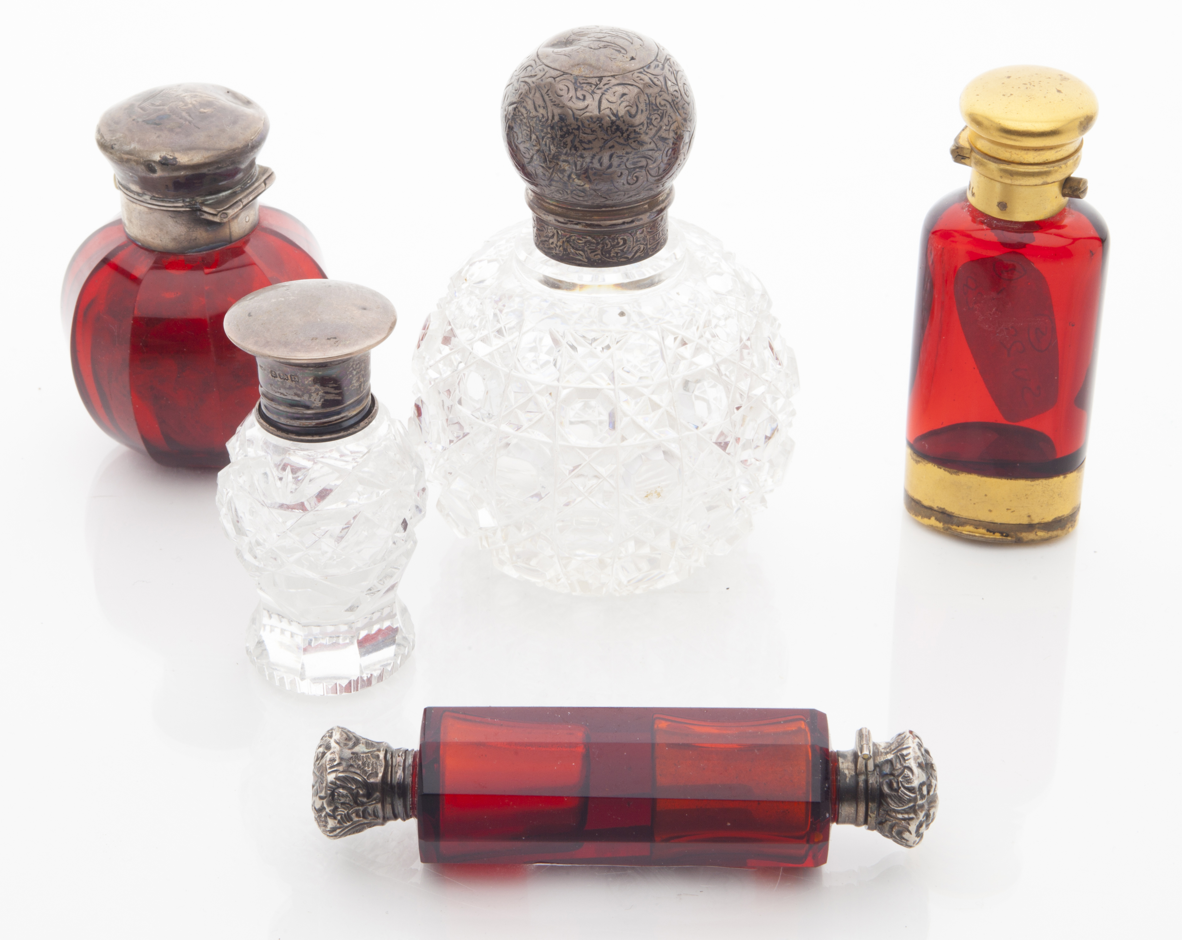A group of Victorian silver and silver gilt scent bottles