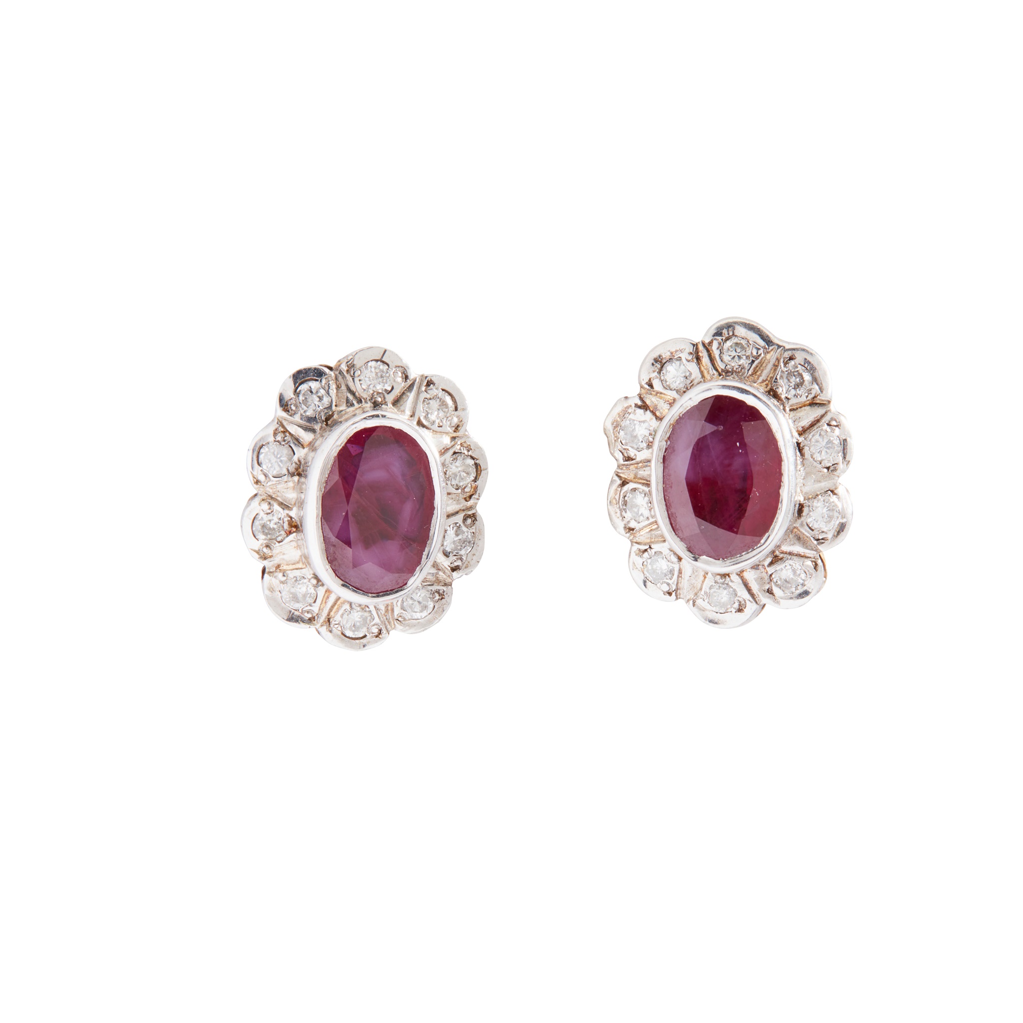 A pair of ruby and diamond cluster earrings