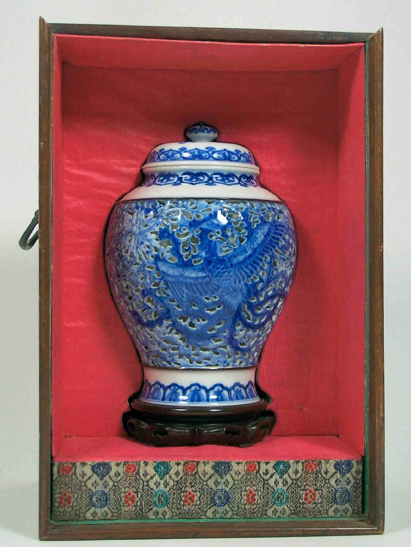 A Japanese reticulated vase and cover Meiji period