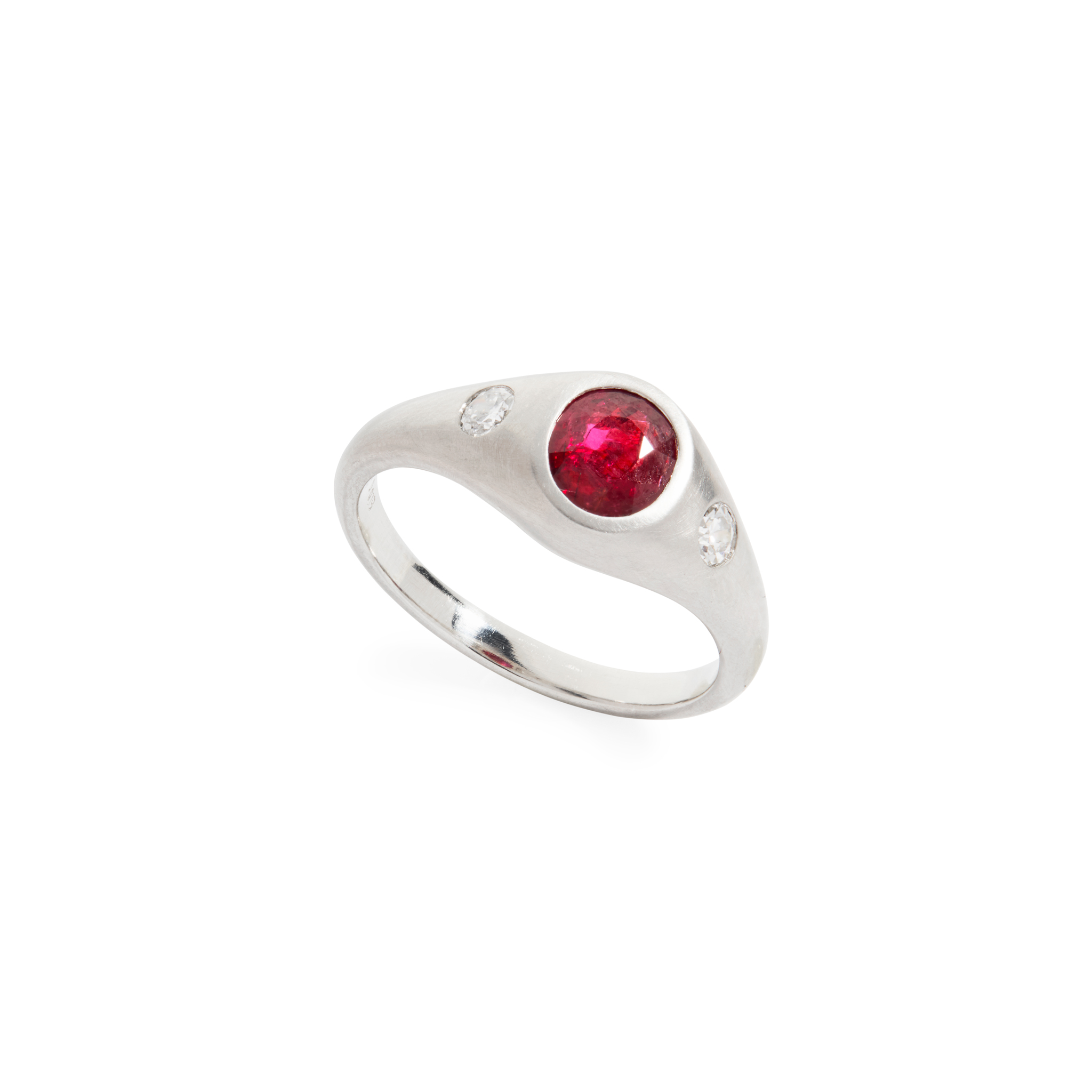 A ruby and diamond three-stone ring