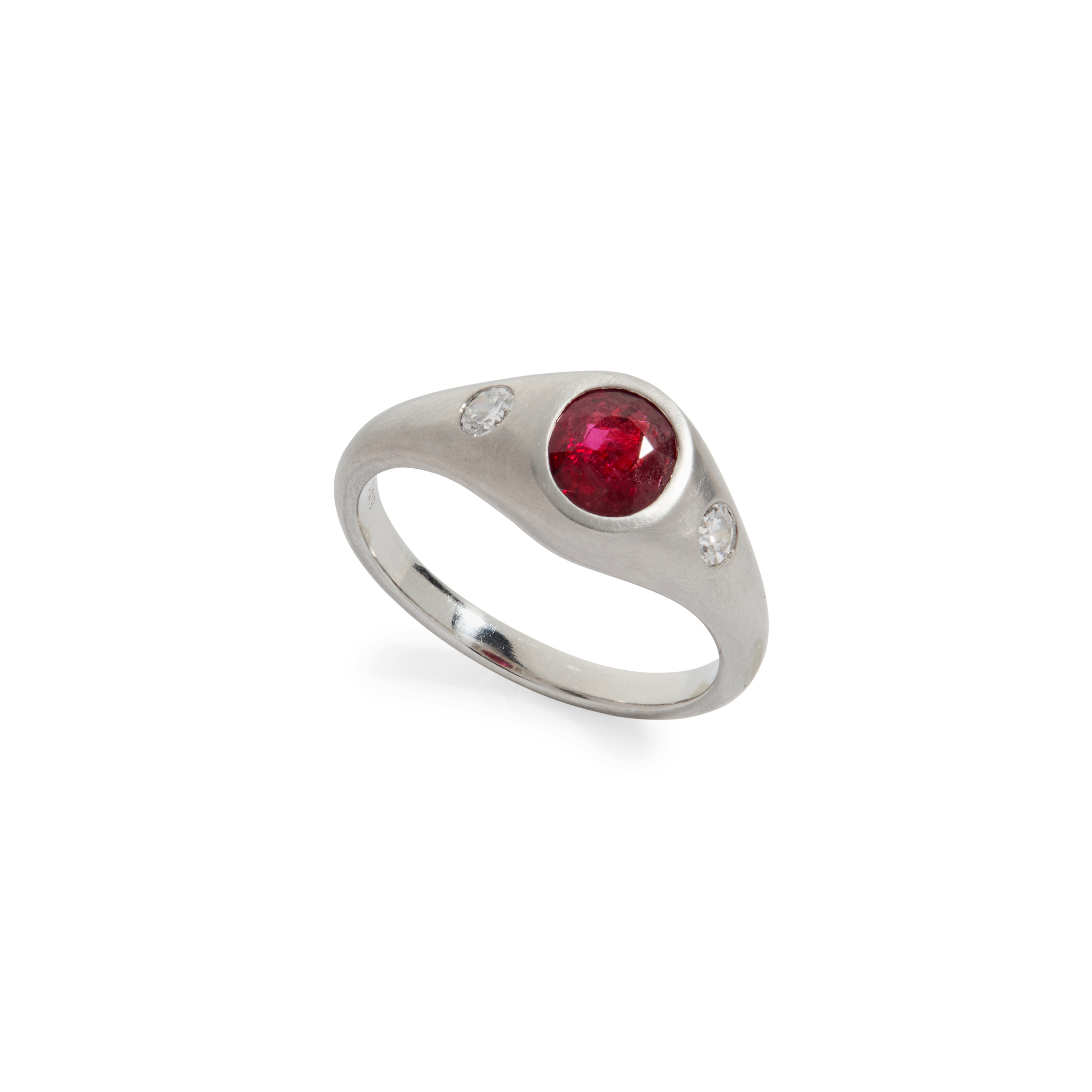A ruby and diamond three-stone ring