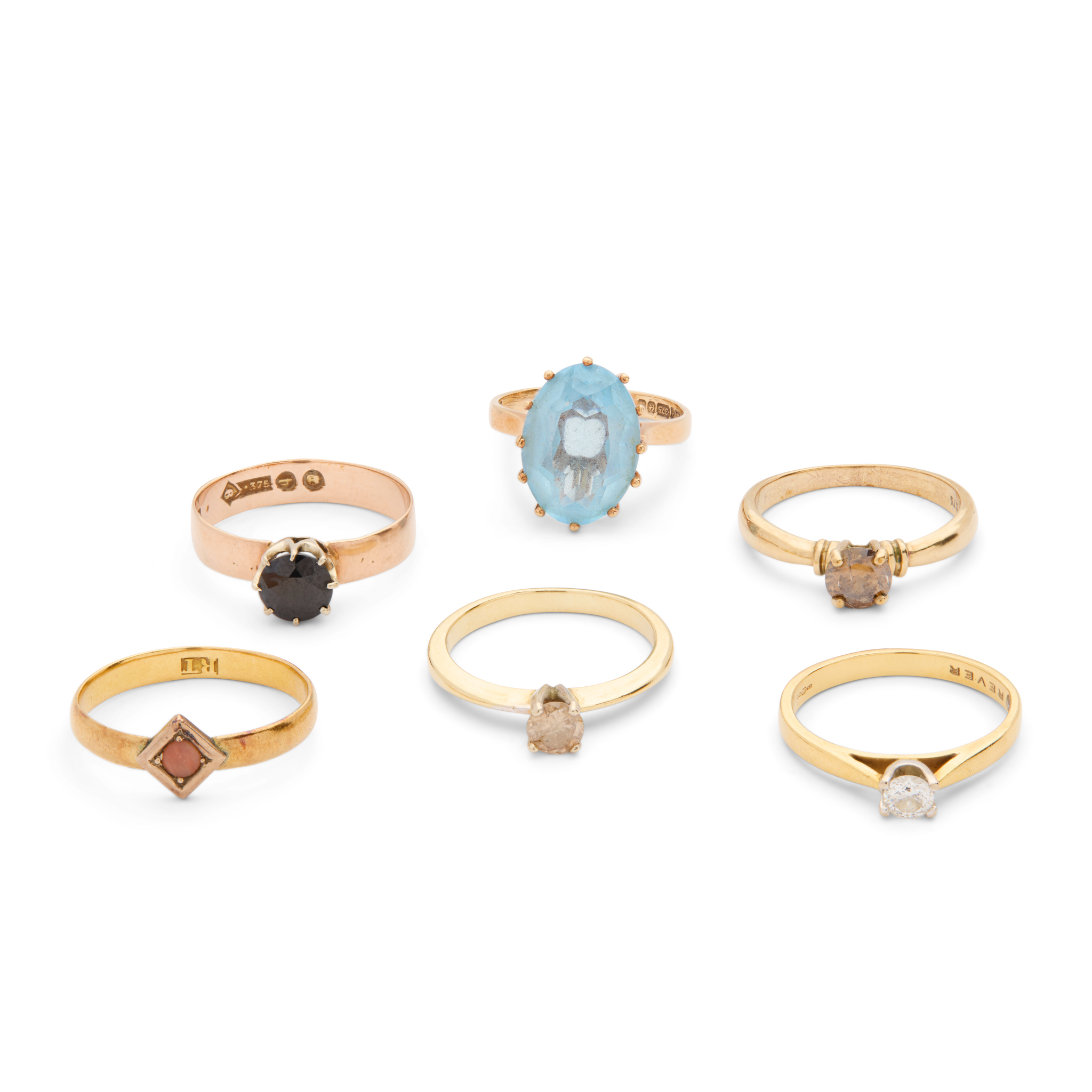 A collection of gem-set rings