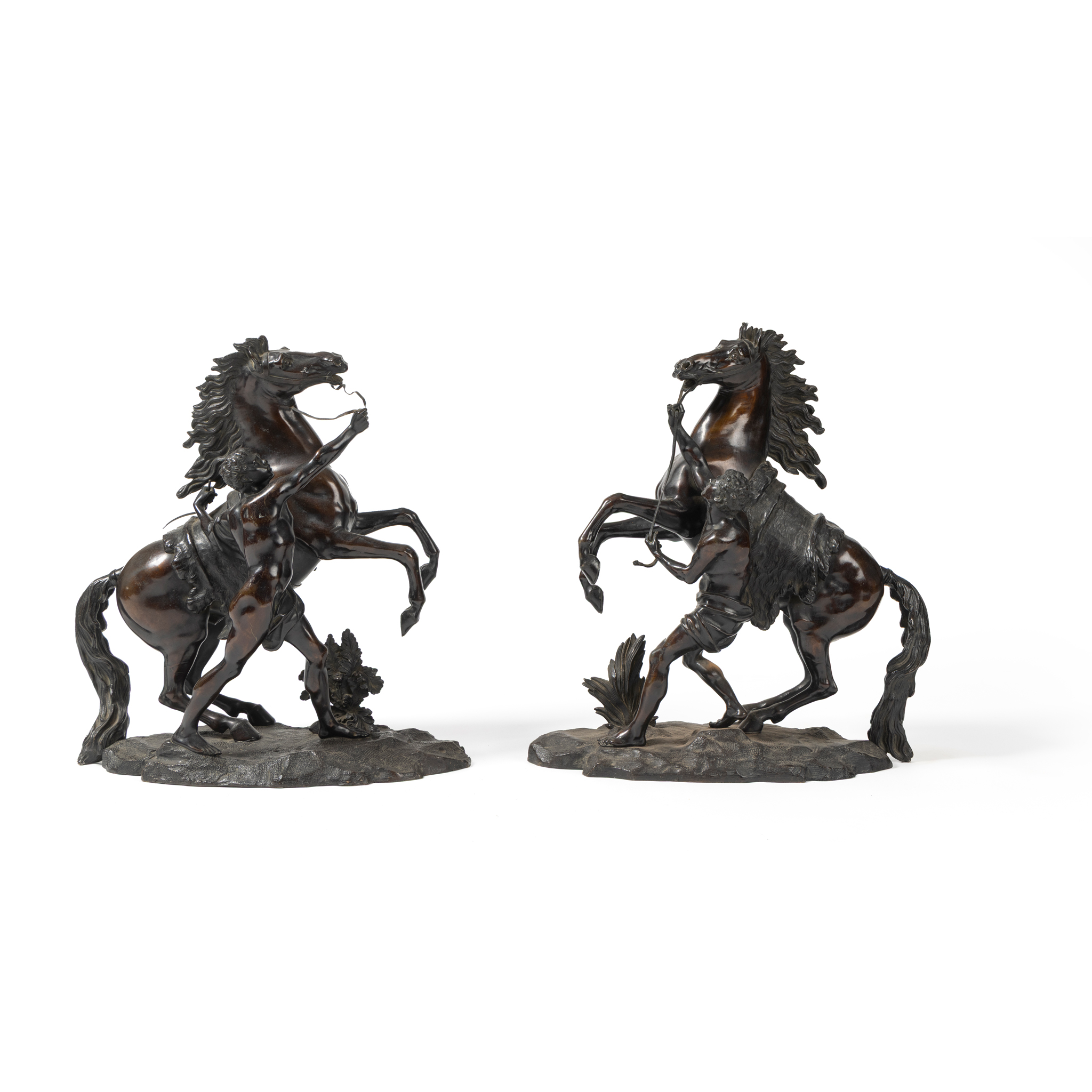 A PAIR OF BRONZE MARLY HORSES, AFTER GUILLAUME COUSTOU (FRENCH 1677-1746)