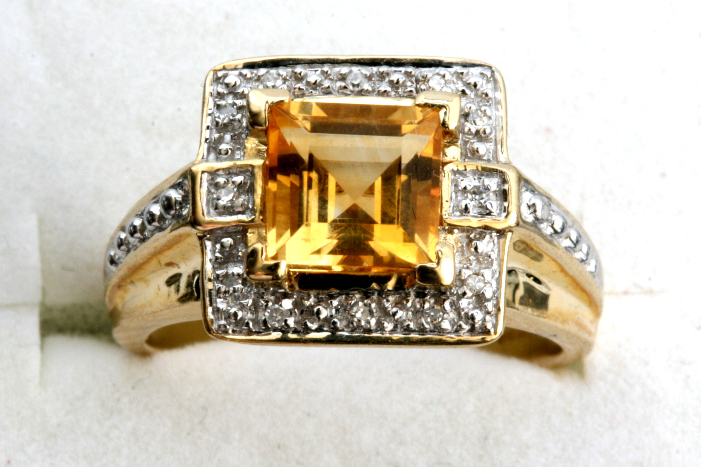 A group of six diamond and gem set dress rings