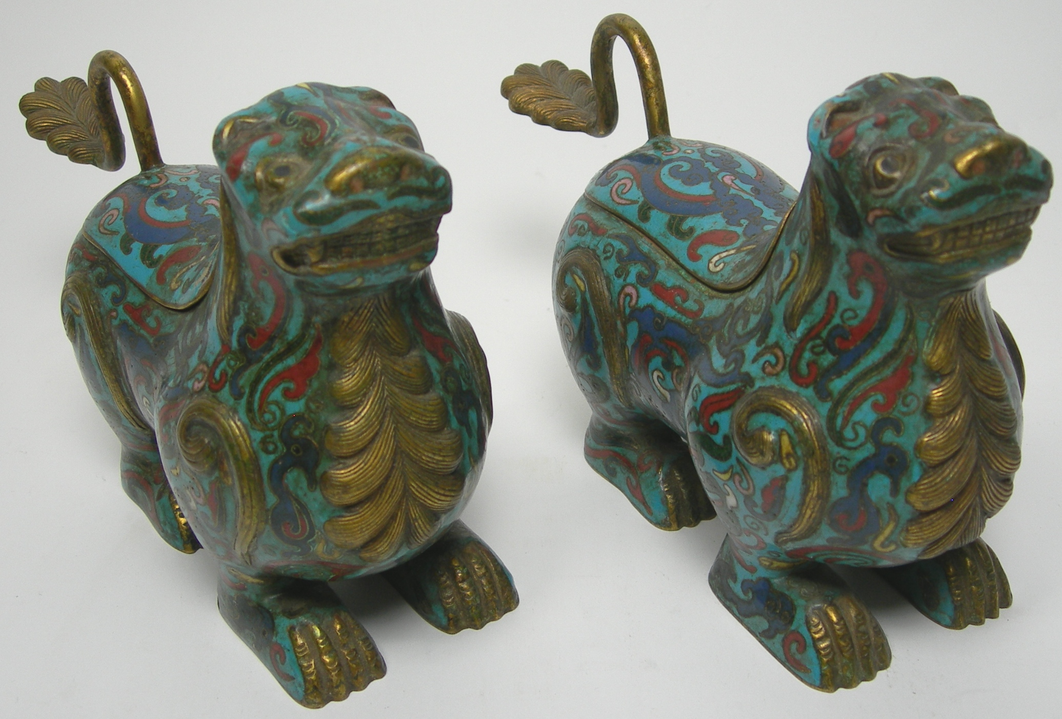 A pair of 18th/19th century Chinese cloisonne lion form boxes and covers