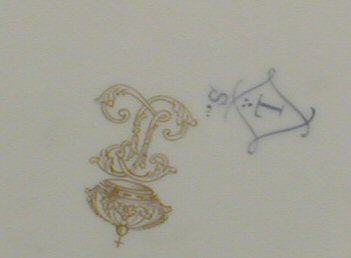 A pair of late 19th century Sevres circular scalloped plates,