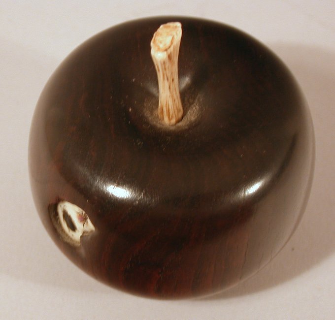 A Japanese carved hardwood shibyama decorated apple