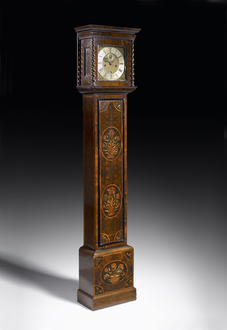 An early 18th century walnut oyster veneered and floral marquetry longcase clock