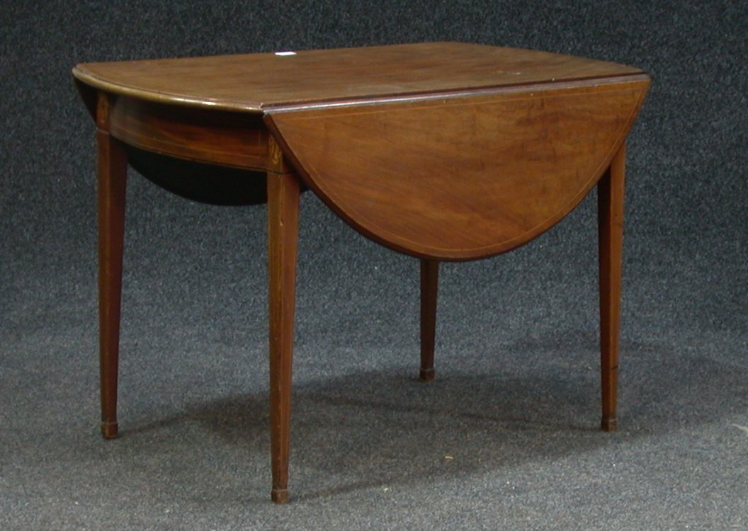 A late 19th century mahogany and line inlaid pembroke oval drop leaf table,