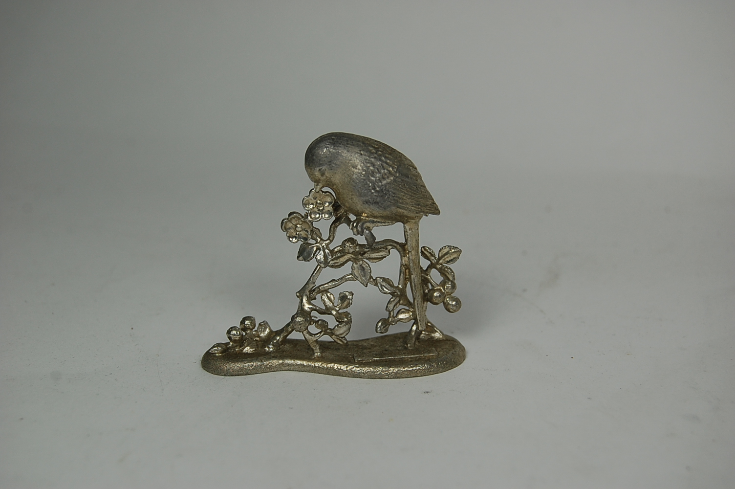 A collection of fifteen modern silver models of birds