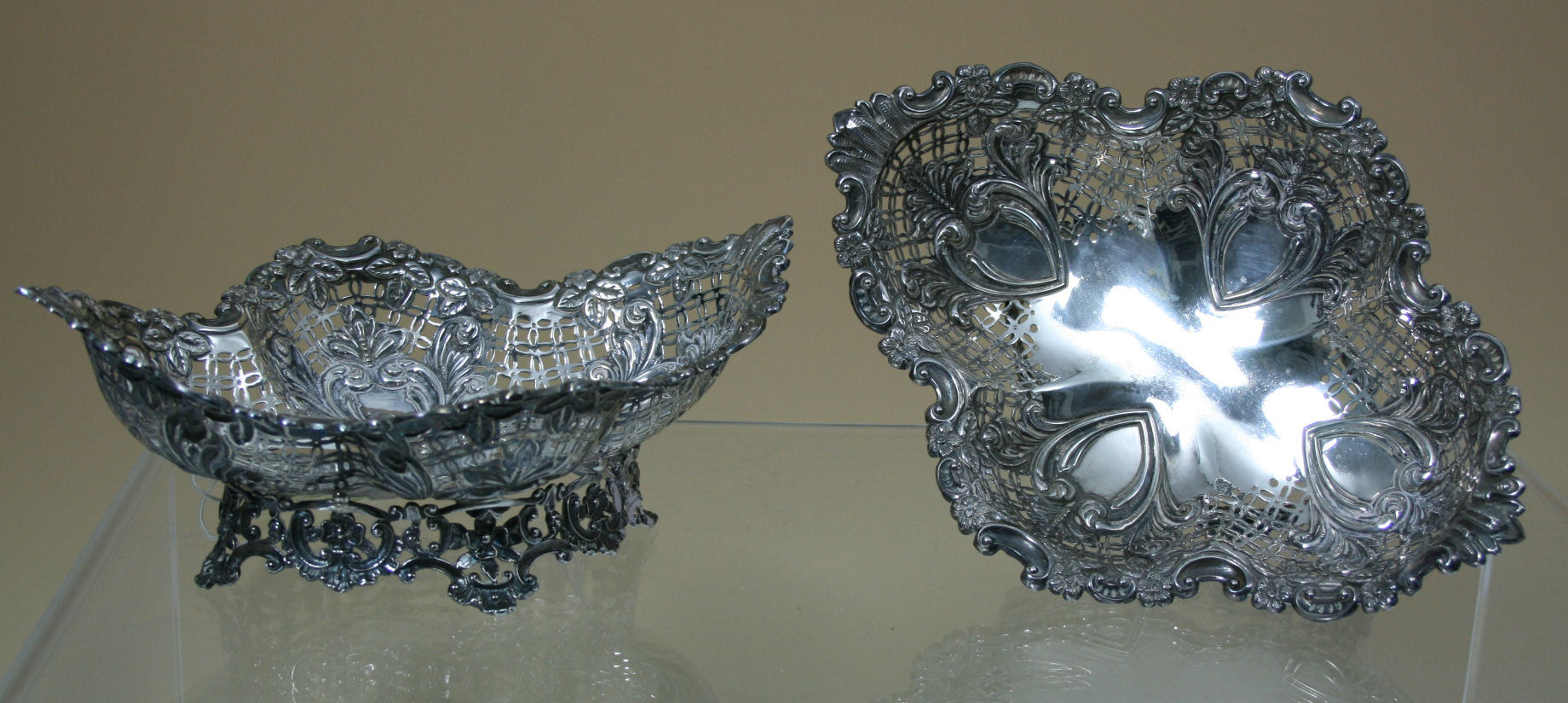 A matched pair of silver fruit baskets