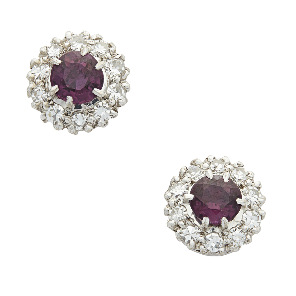 A pair of ruby and diamond set cluster earrings