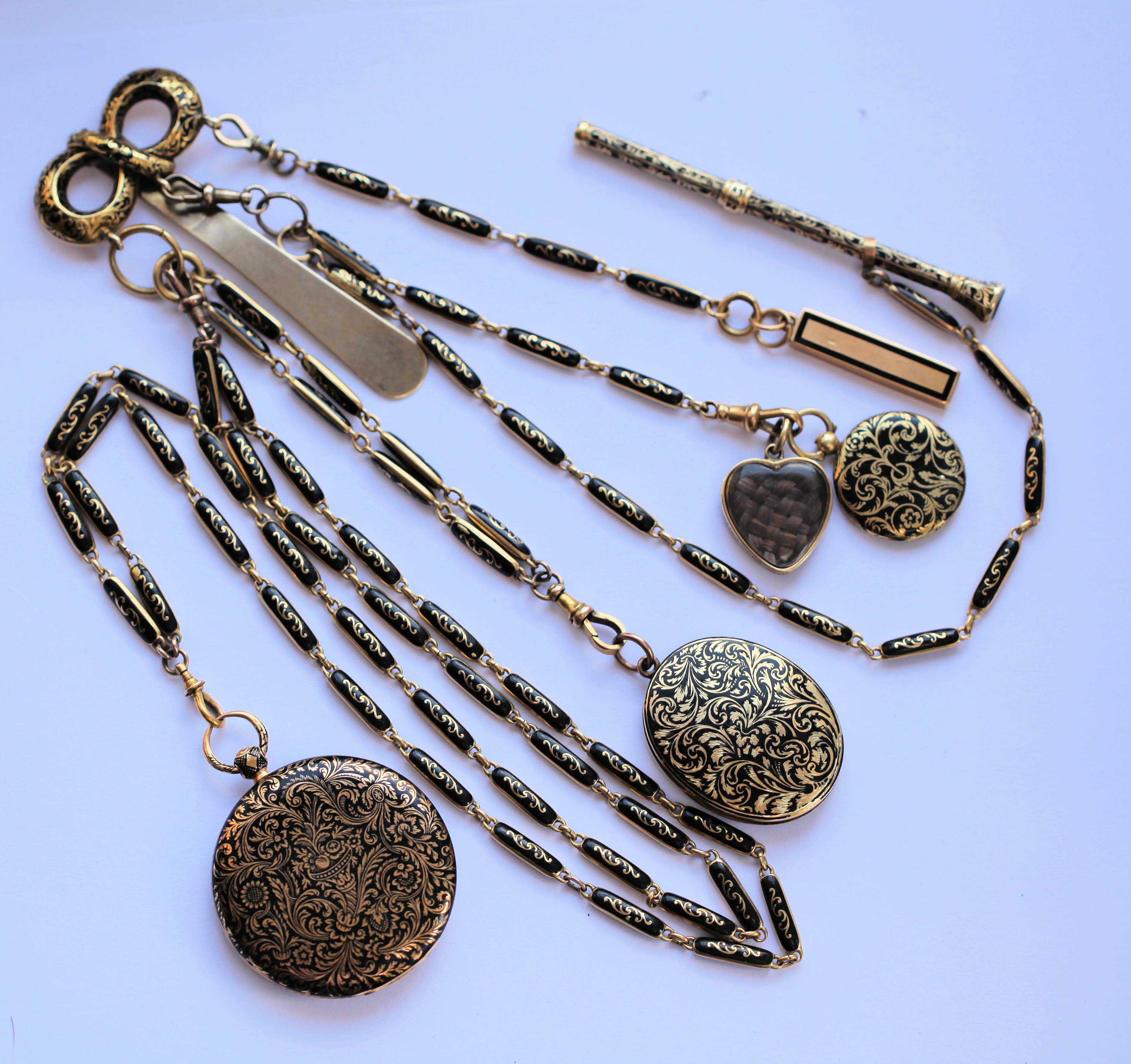 A late 19th Century enamel chatelaine