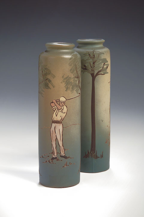 A pair of Weller, Dickens Ware pottery vases,