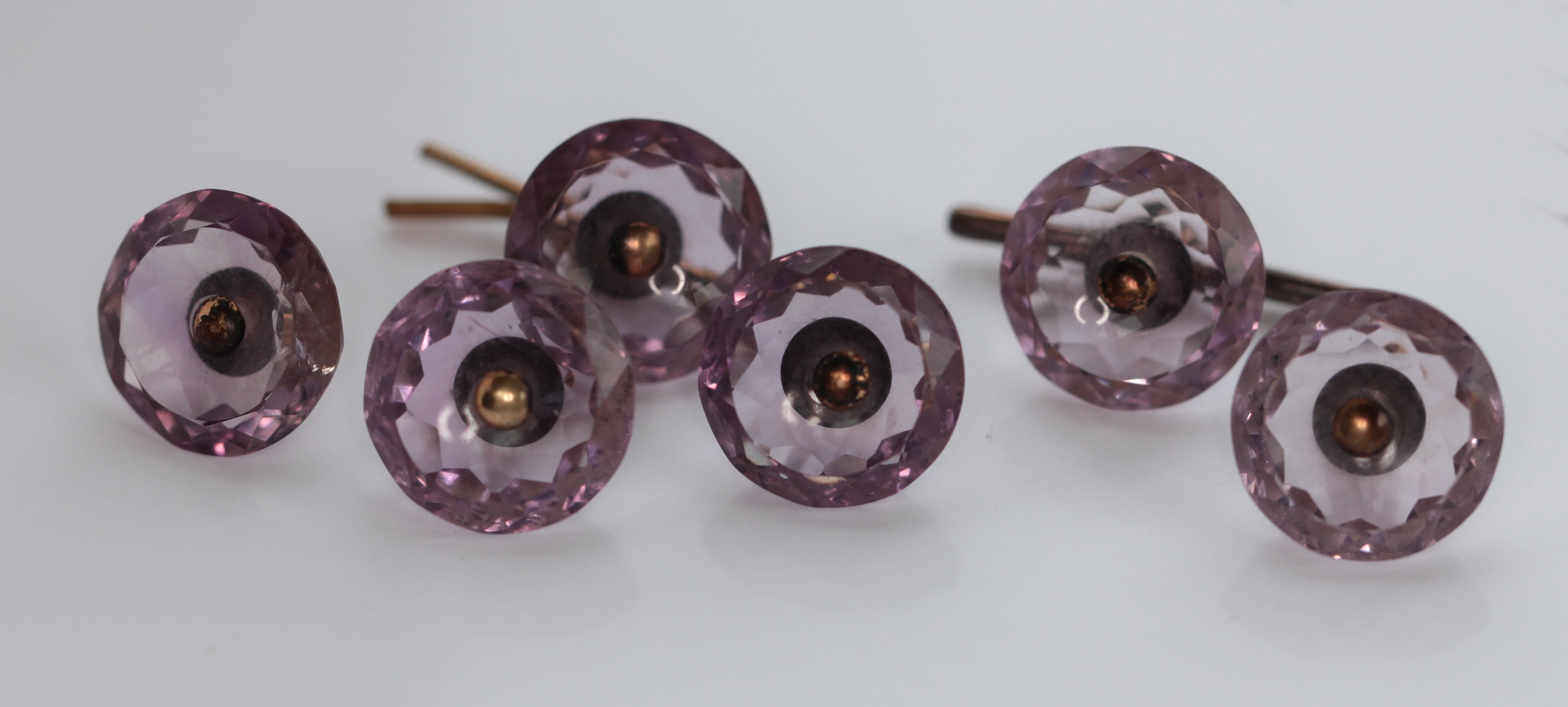 A gentleman's amethyst set suite of dress buttons