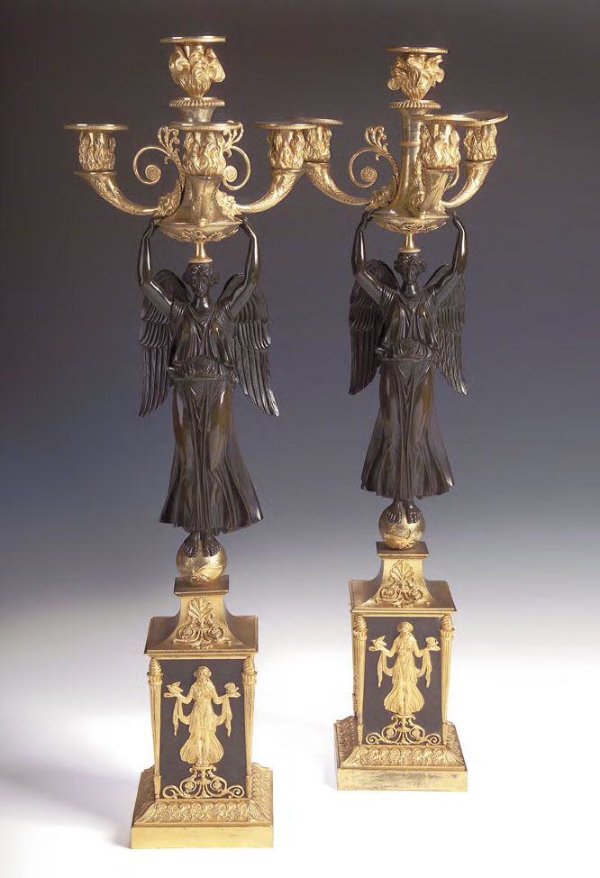 A pair of Regency gilt and patinated bronze candelabra,
