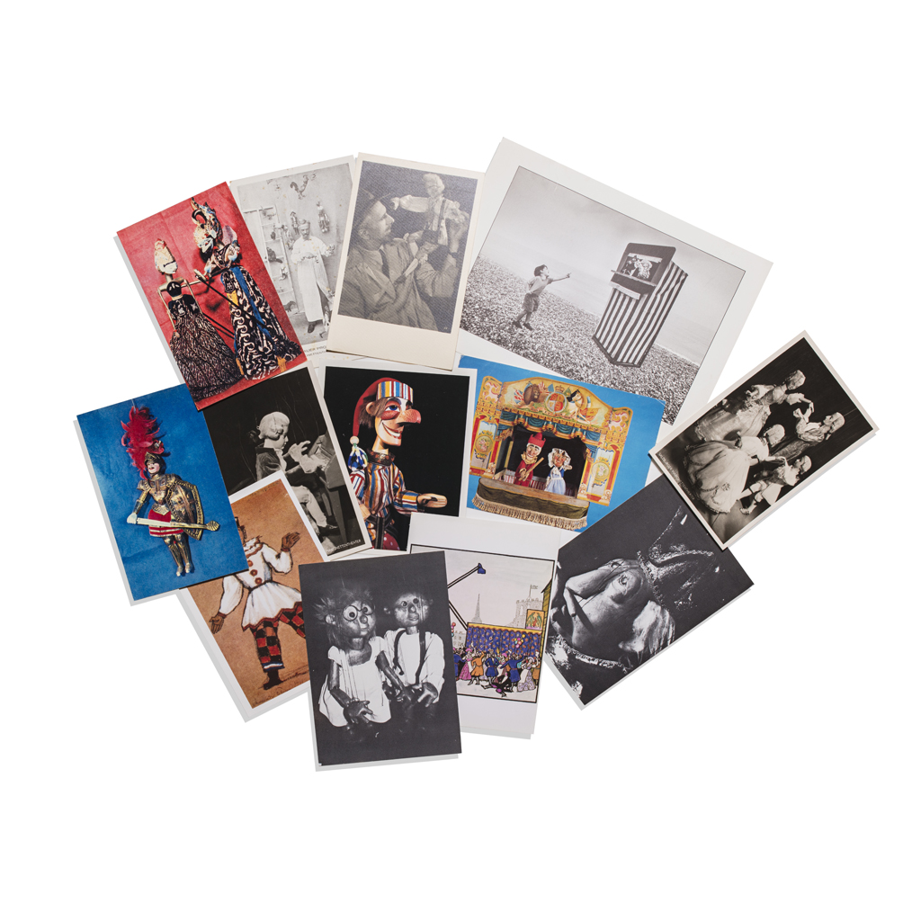 A COLLECTION OF 9 ALBUMS FILLED WITH POSTCARDS