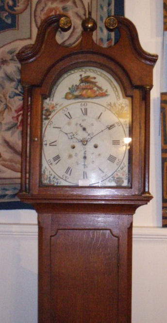 A George IV oak longcase clock