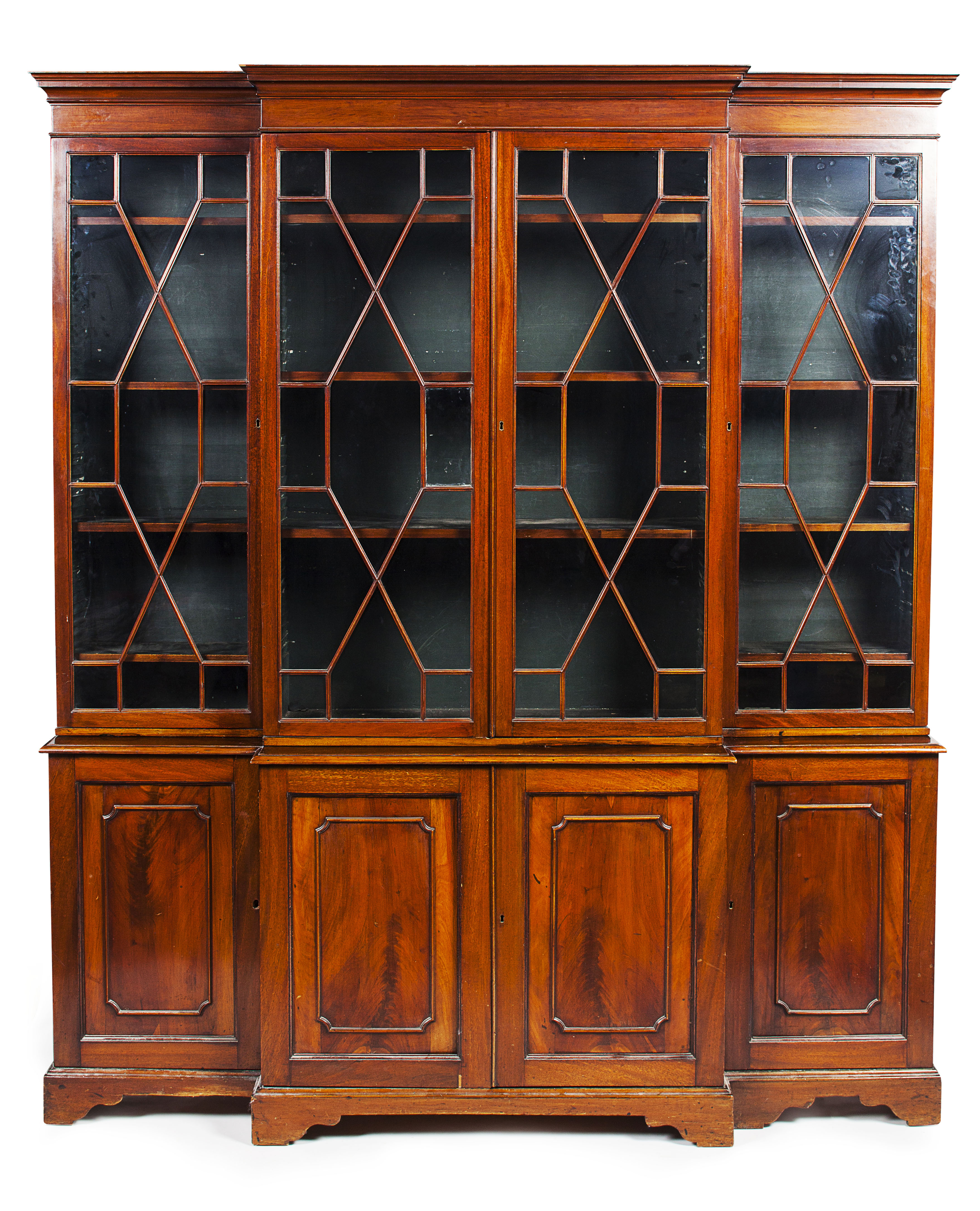 GEORGE III STYLE MAHOGANY BREAKFRONT BOOKCASE