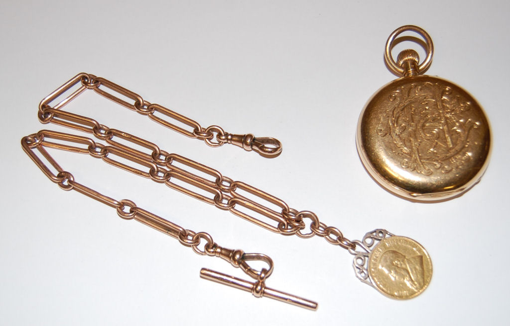 A continental gold hunter cased pocket watch ALTERATION: The silver gymnastics medal has been withdrawn from this lot