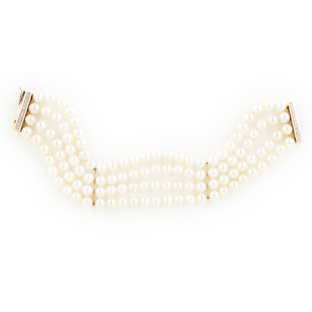 A cultured pearl and diamond set bracelet