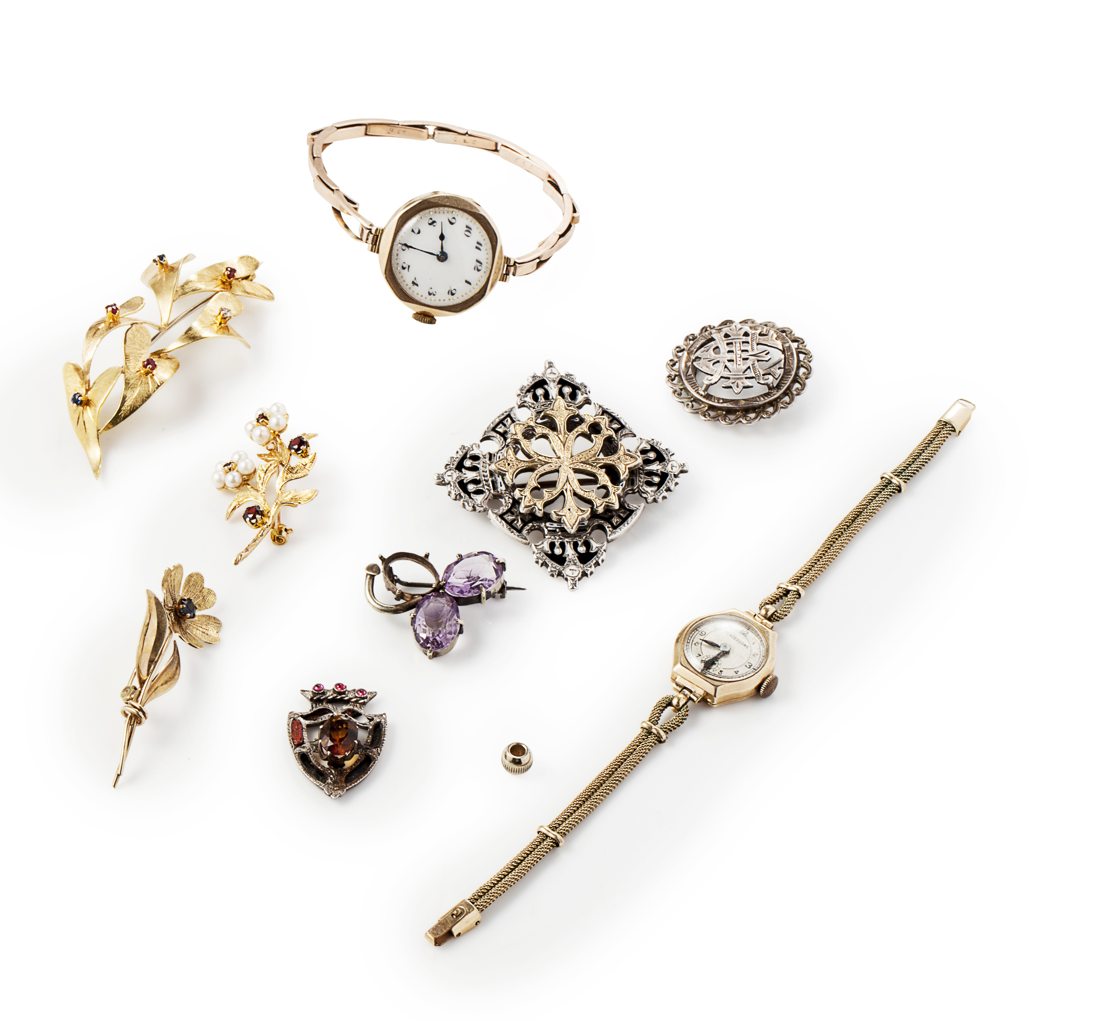 A collection of brooches