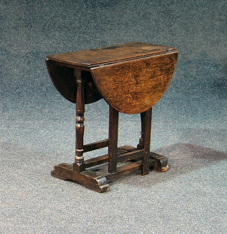 An oak gateleg table