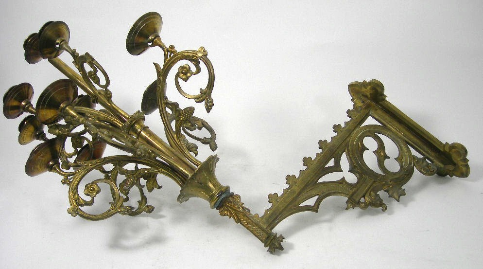 A pair of Victorian Gothic Revival gilt-brass ten-light wall sconces