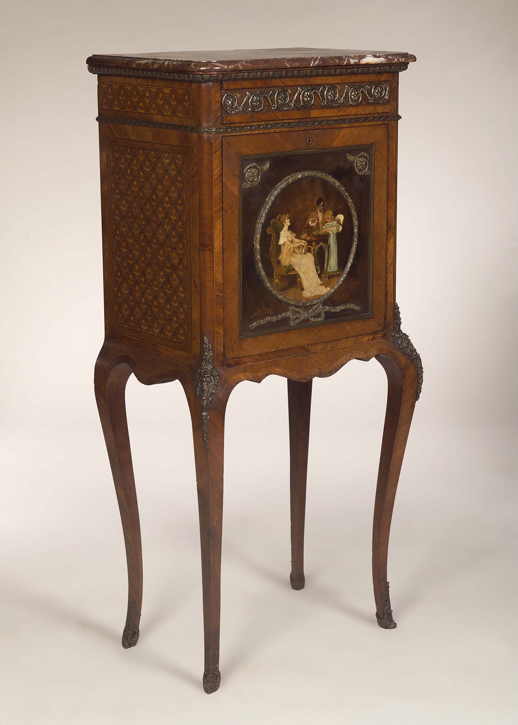 An Edwardian dwarf kingwood bureau a abatant,