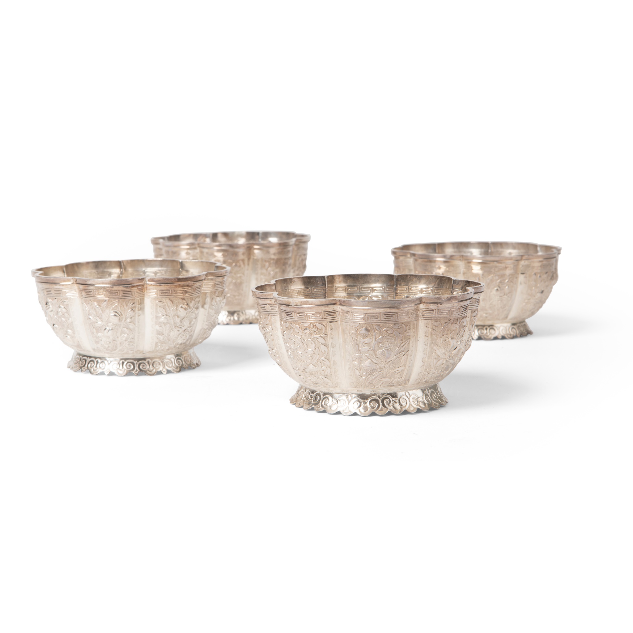 GROUP OF FOUR EXPORT SILVER LOBED BOWLS