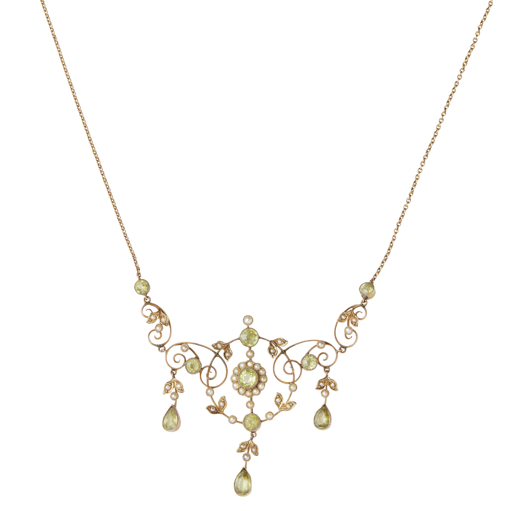 An early 20th century seed pearl and peridot set necklace