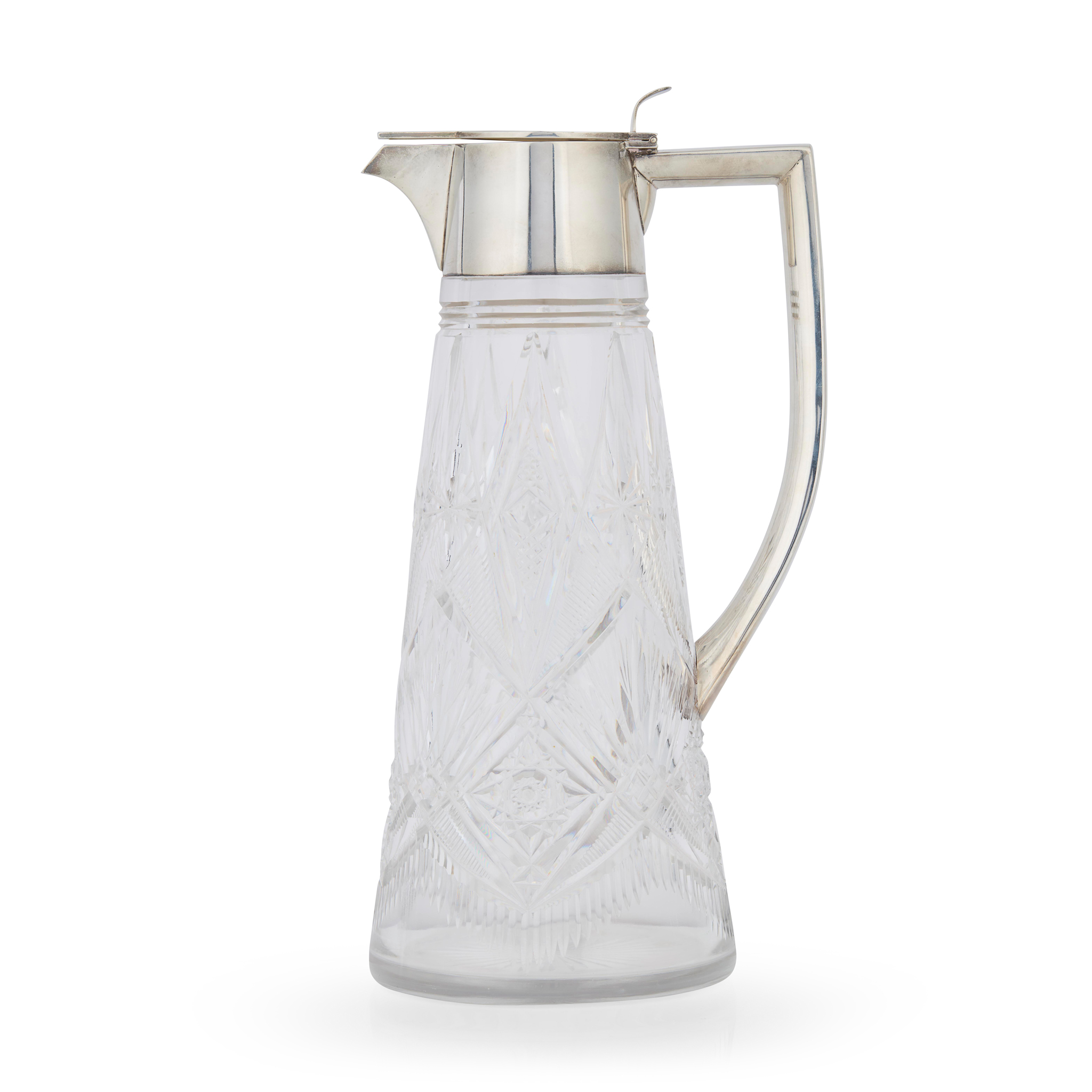 A 1920s SILVER-MOUNTED CLARET JUG