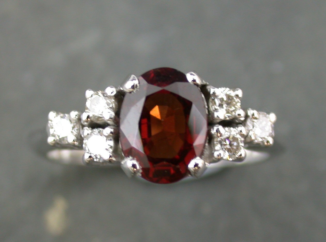 A garnet and diamond ring,