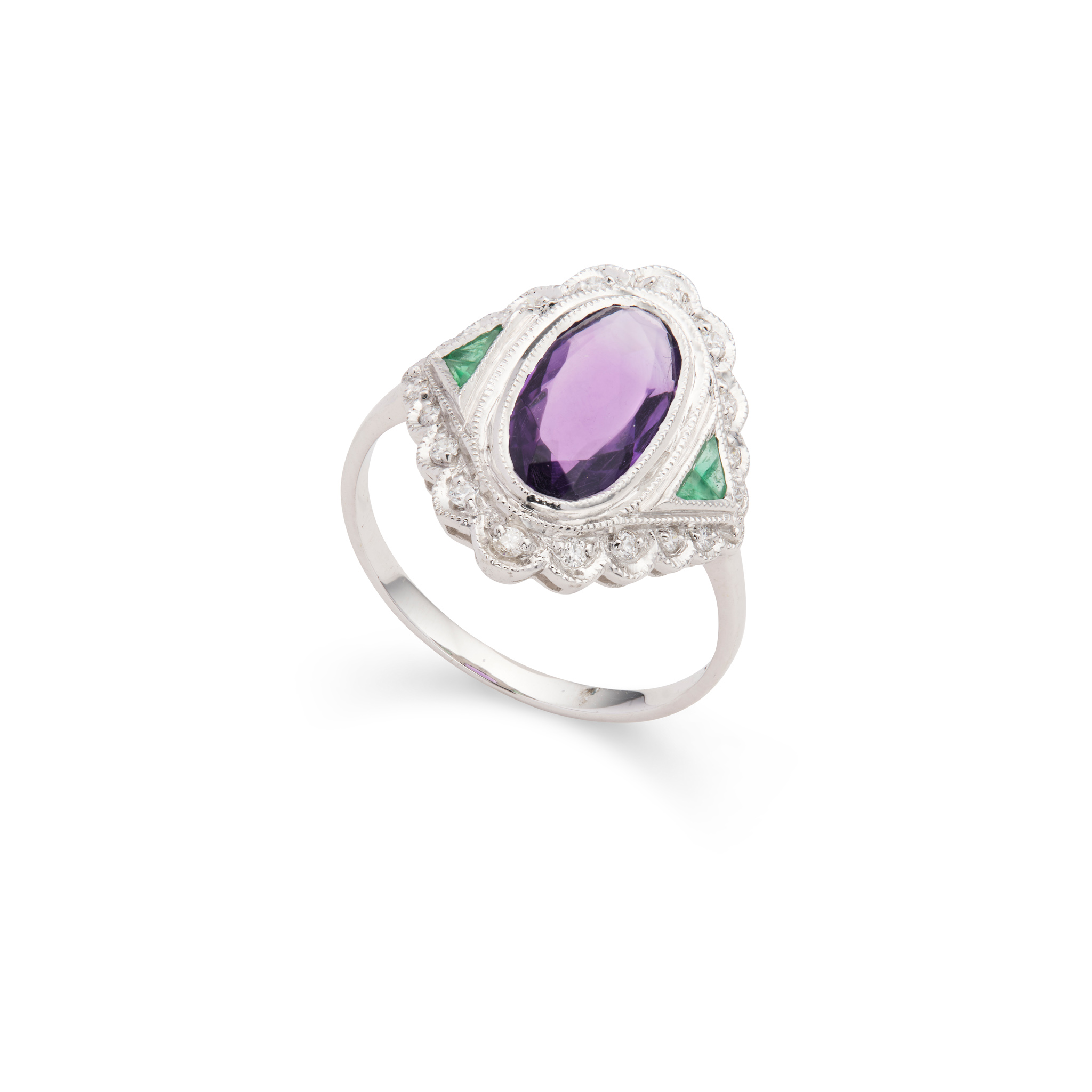 An amethyst, emerald and diamond dress ring