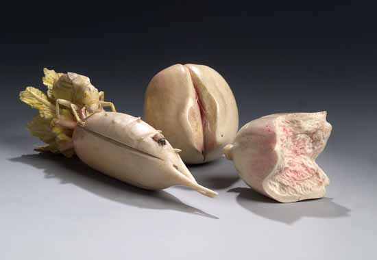 A Japanese carved ivory swede
