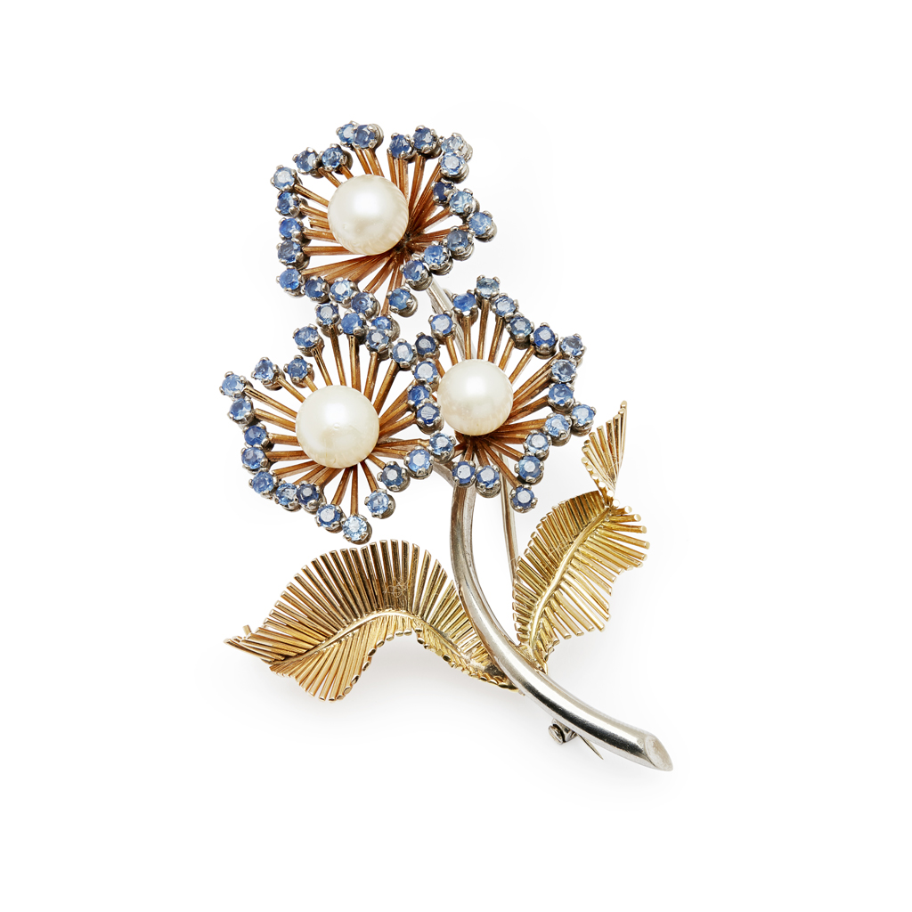 A sapphire and pearl set floral brooch