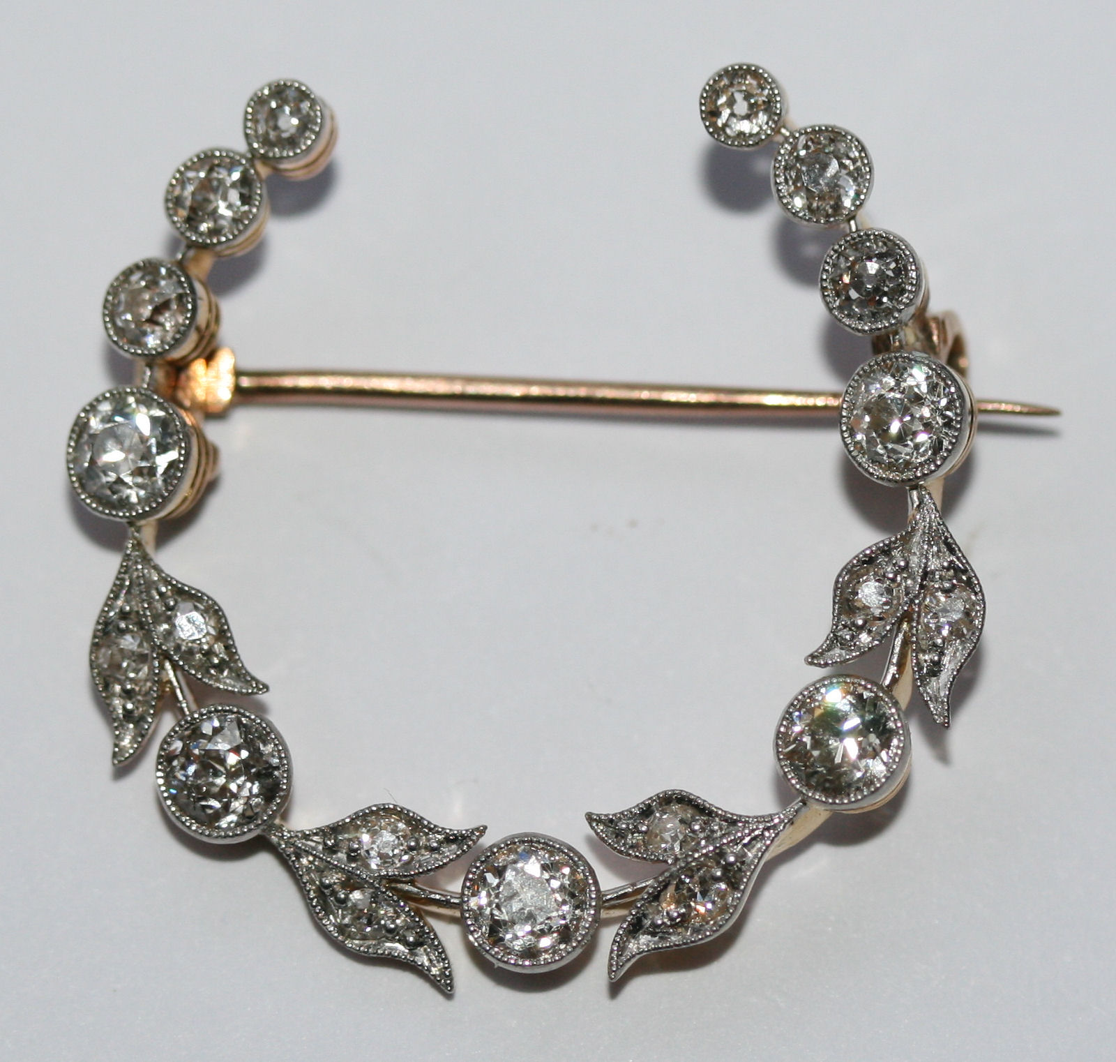 A Victorian diamond set crescent brooch