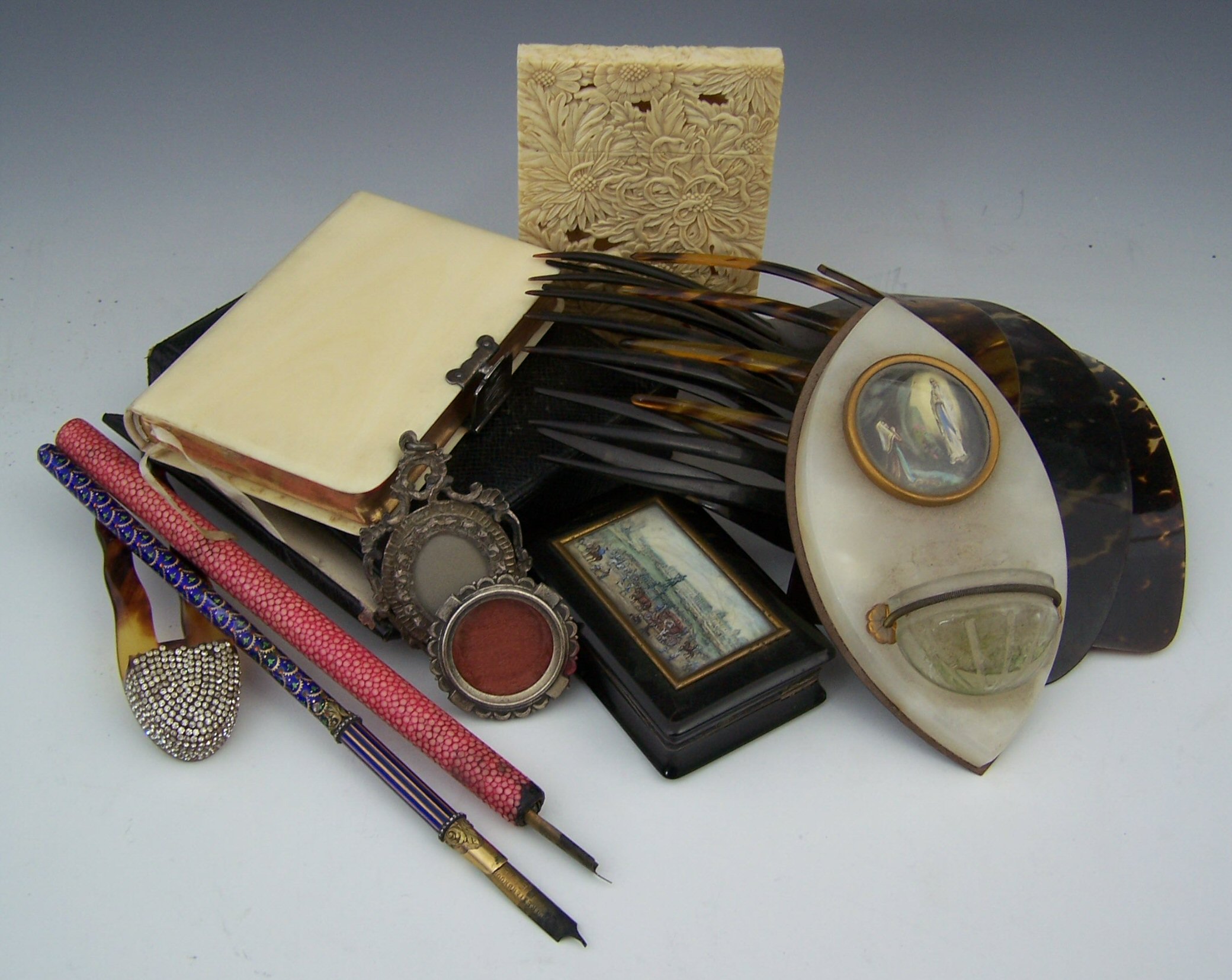 A Japanese carved ivory calling card case,