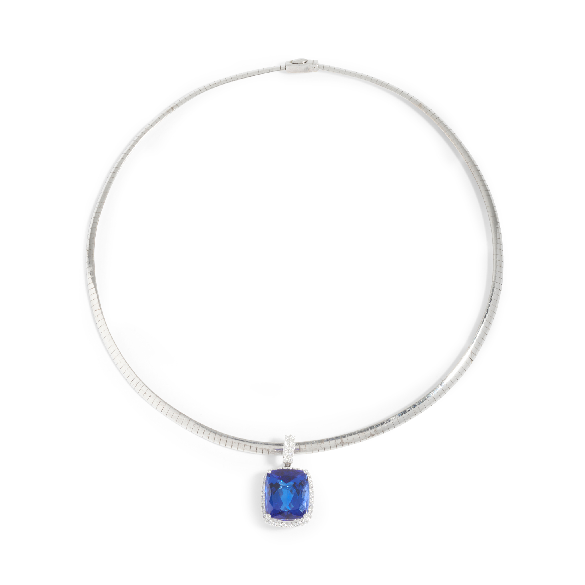 A Tanzanite and diamond pendant necklace