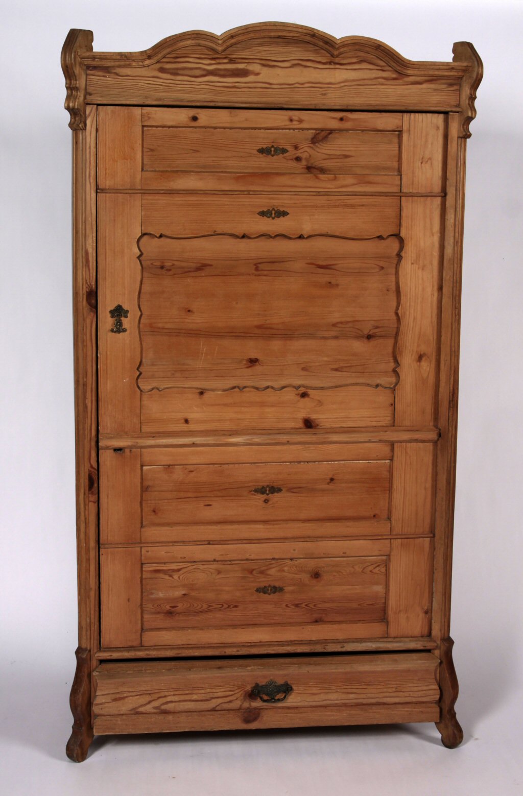 A Continental pine press cupboard
