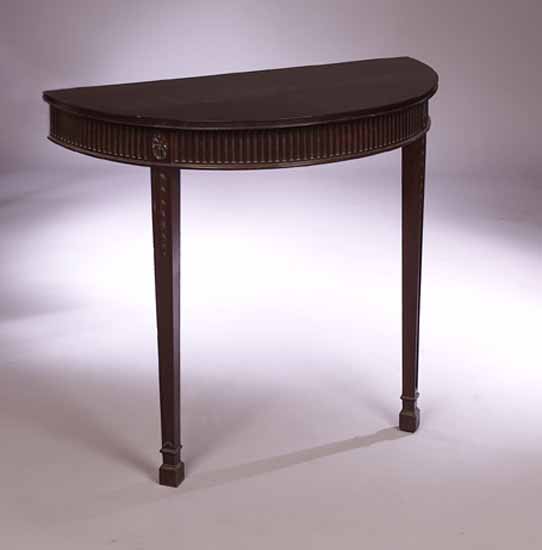A pair of George III style semi circular mahogany side tables,