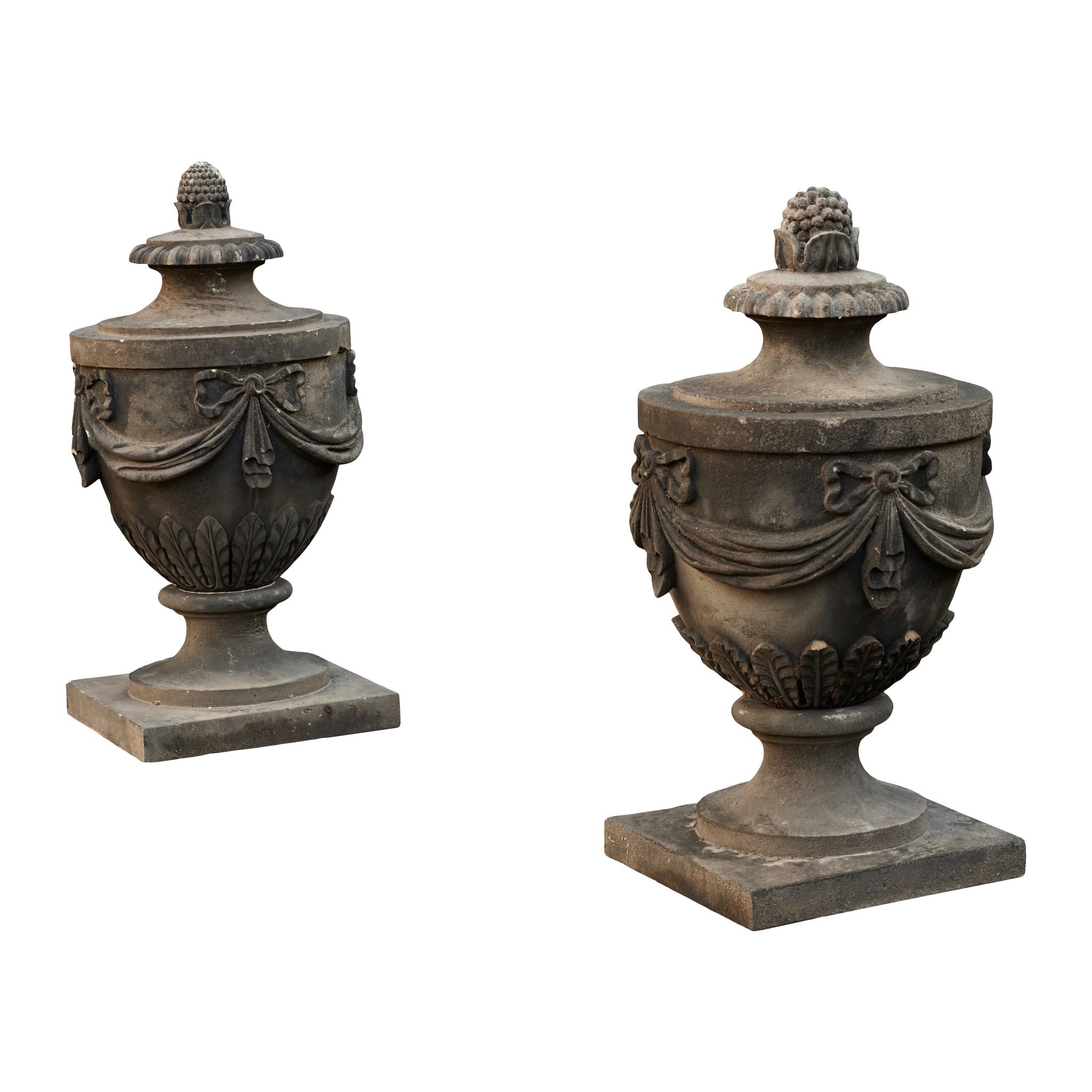PAIR OF CARVED SANDSTONE ADAM STYLE URNS