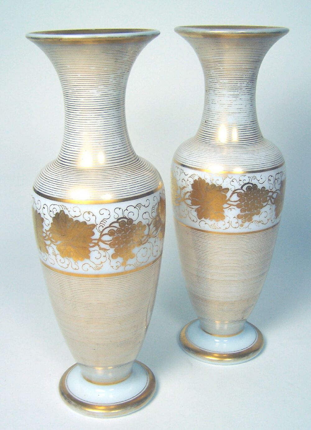 A pair of late 19th century Continental milk glass vases