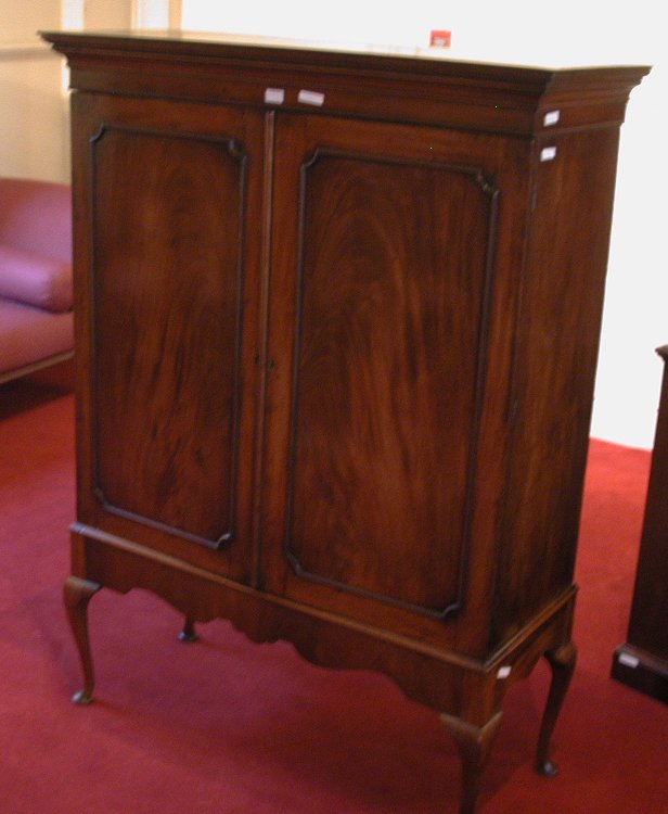 A mahogany side cabinet,