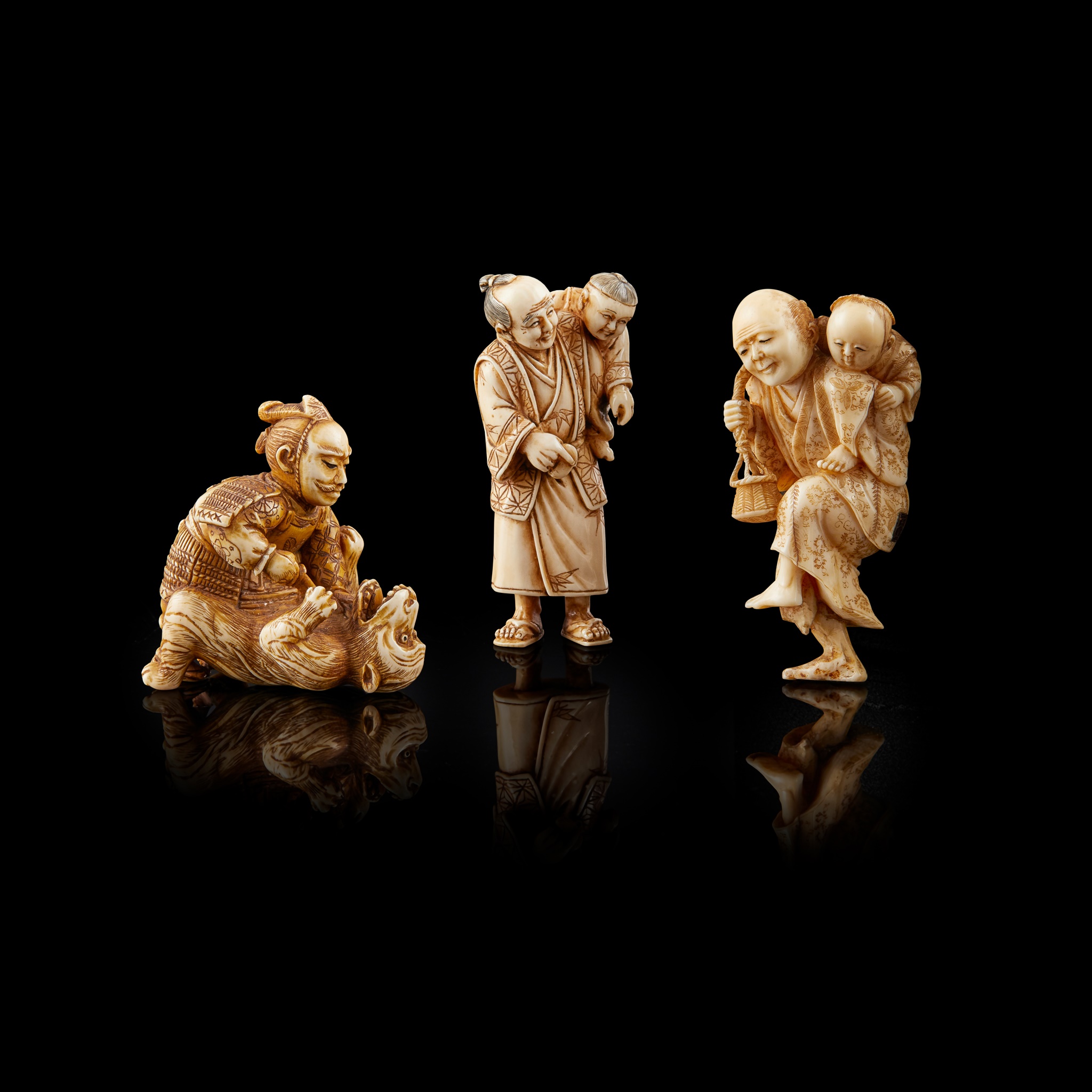 GROUP OF THREE IVORY NETSUKE