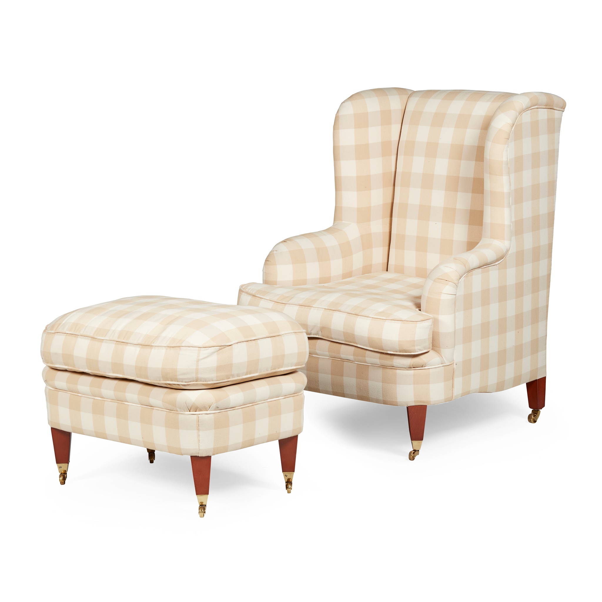 UPHOLSTERED WING ARMCHAIR AND OTTOMAN